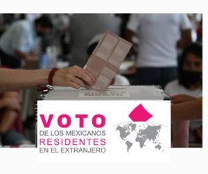 Una mano introduciendo una boleta electoral en una urna